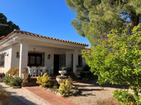 Villa con jardín
